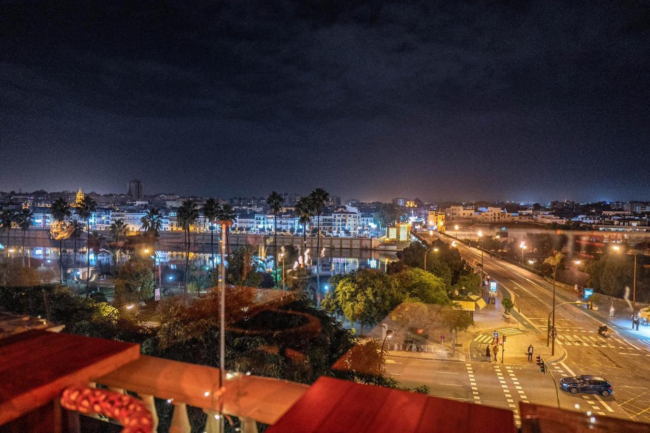 Hotel Lobby Севілья Екстер'єр фото Rabat at night