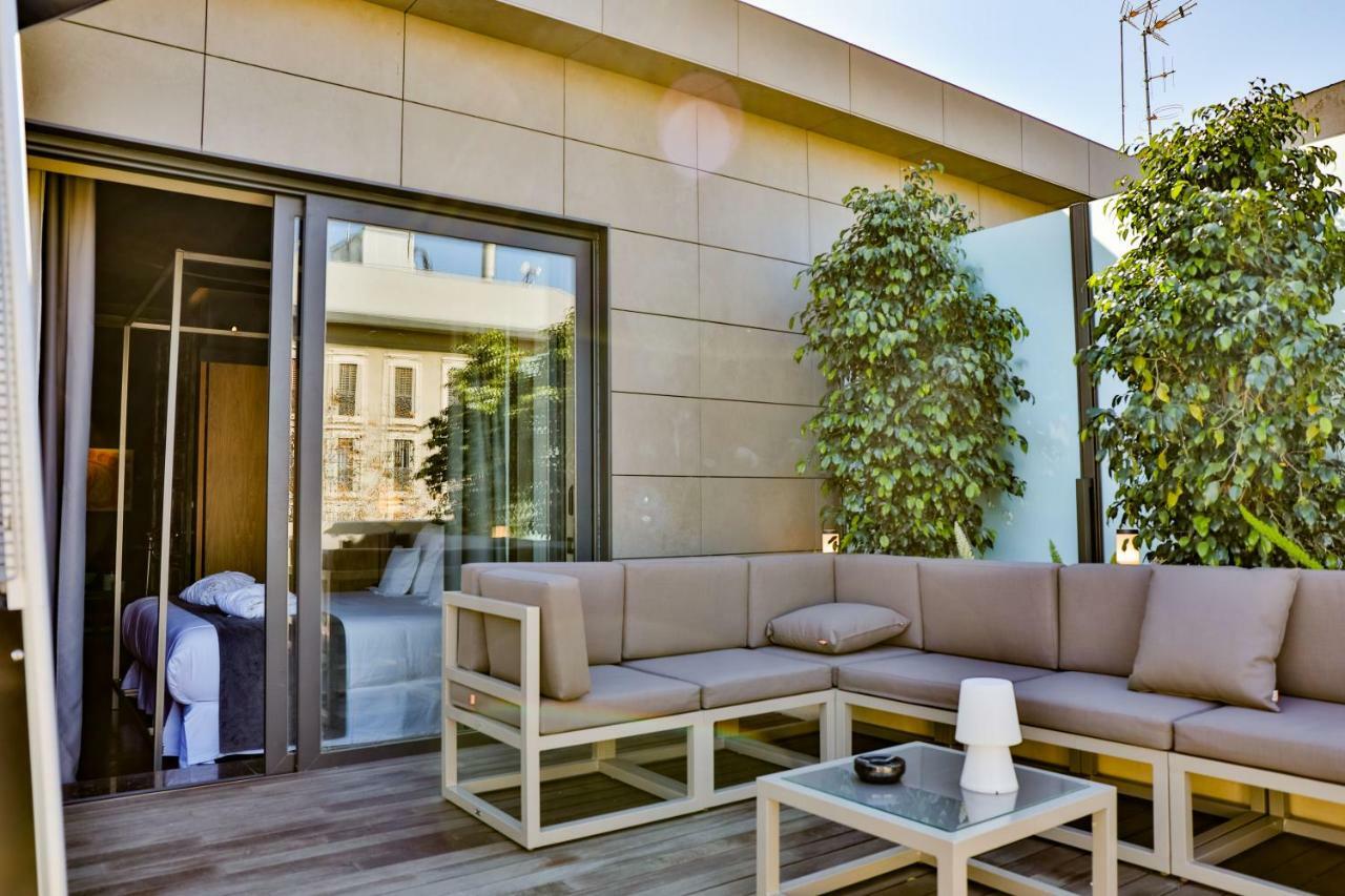 Hotel Lobby Севілья Екстер'єр фото The hotel's rooftop