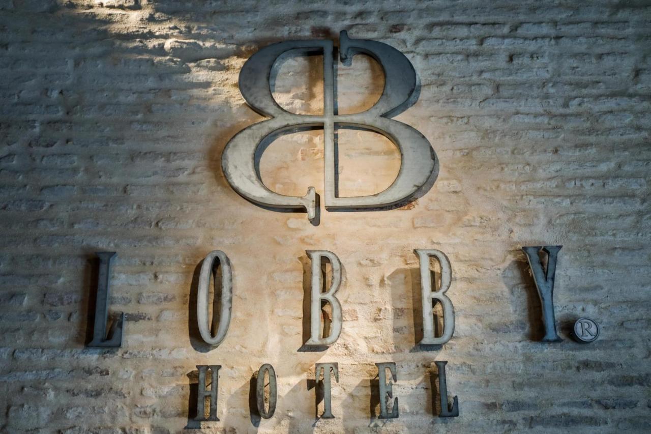 Hotel Lobby Севілья Екстер'єр фото The logo of the 88th Fighter Group